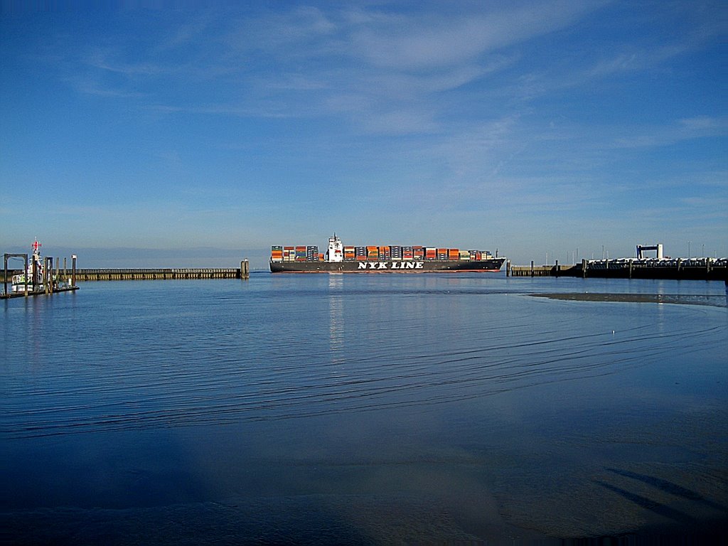 Container vessel passing River Elbe,Cuxhaven,Germany by HalvardCux