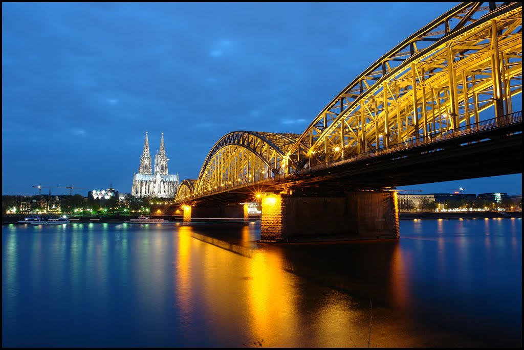Winner of Honorable Mention Contest MAY 2011- Blue Hour in Cologne - 30 sec.- River Rhine,  Hohenzollernbrücke , the Dom Cathedral of Cologne - UNESCO World Heritage - Germany - [By Stathis Chionidis]