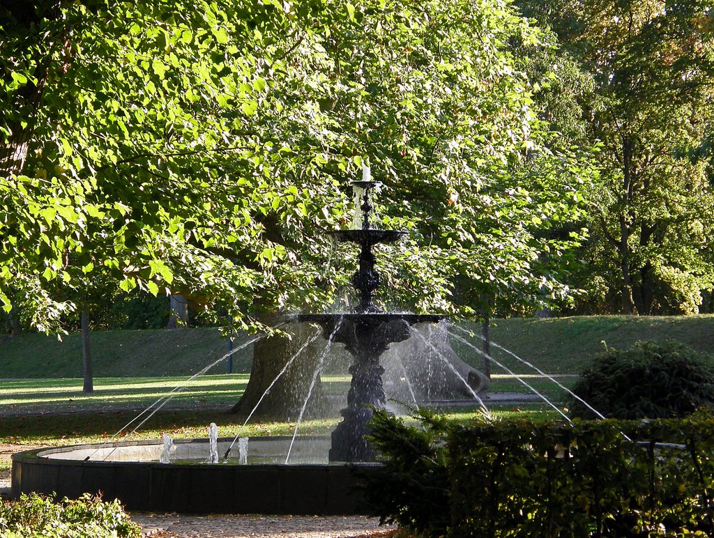 Fountain in an autumn evening light