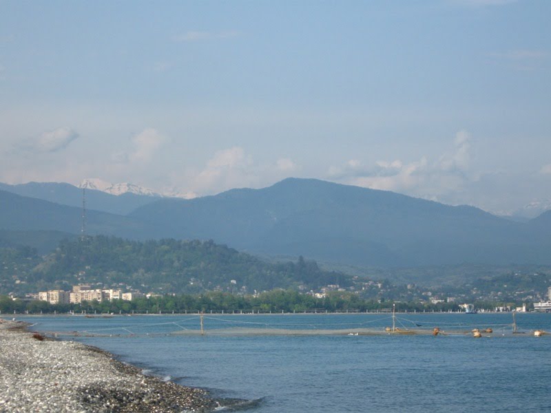 view of the Sea, the city, and the mounts