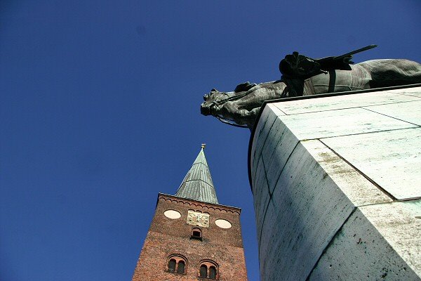 Aarhus Cathedral and a King statue