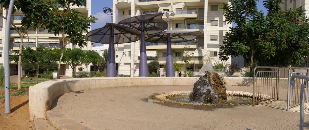 Fountain near houses