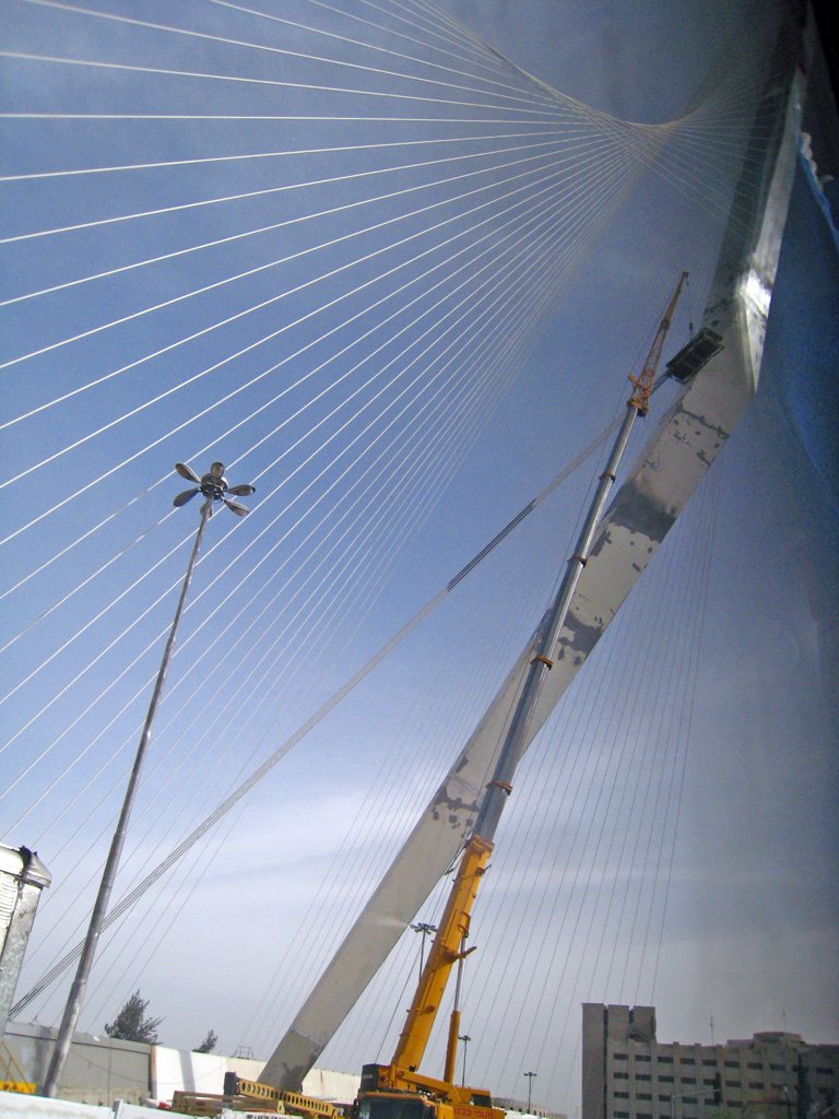 Underneath the strings bridge