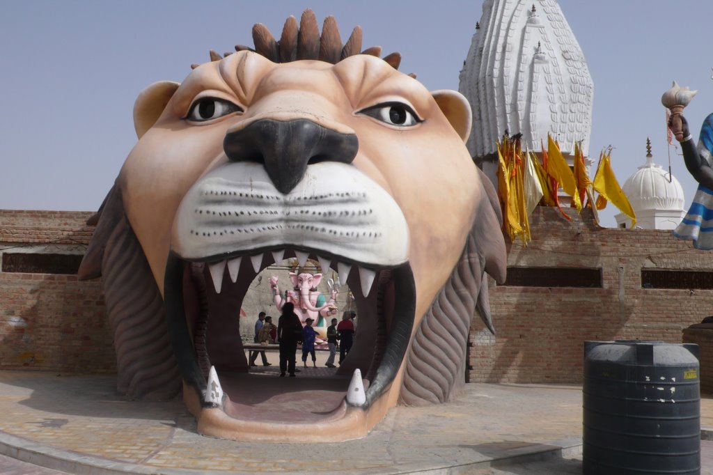 Ganesh  God in the  mouth of lion