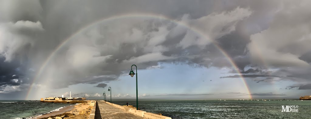 Panoramica de la Caleta con arcoiris