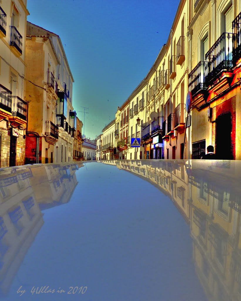 Car reflection in Barrio Nuevo Street of Caceres downtown: Unesco`s  Heritage of Mankind