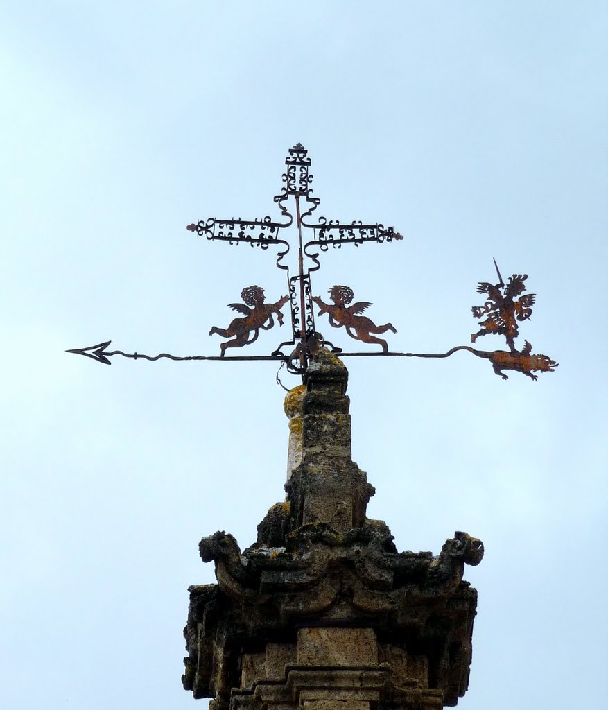 Wetterfahne auf dem Dach einer alten Villa