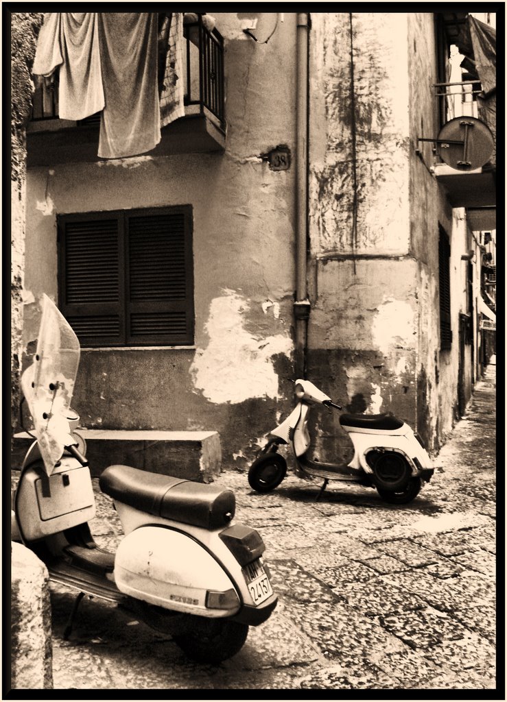turning the corner past the sleeping scooters