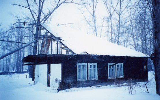 Rest of a 1940s barrack in Leninogorsk (now Ridder), Kazakhstan. This picture was taken in December 2000, when the building was still inhabited. It has probably been demolished by now.