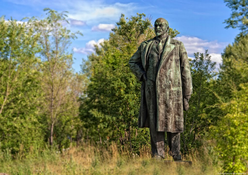 Lenin statue amongst tree (legacy of the Soviet Union)