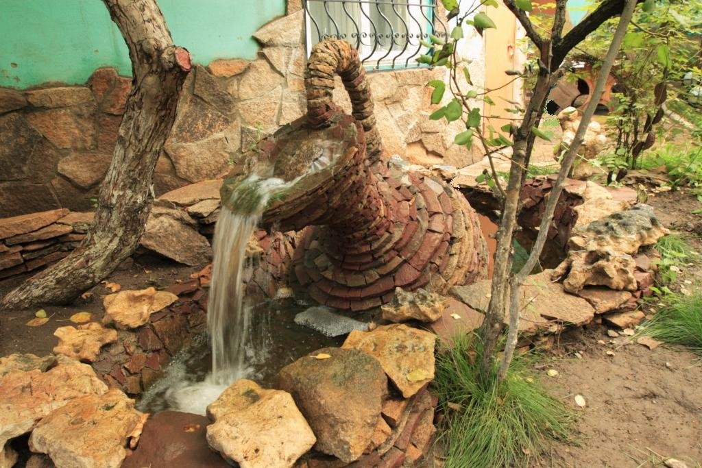 Jug full of water at the restaurant garden.