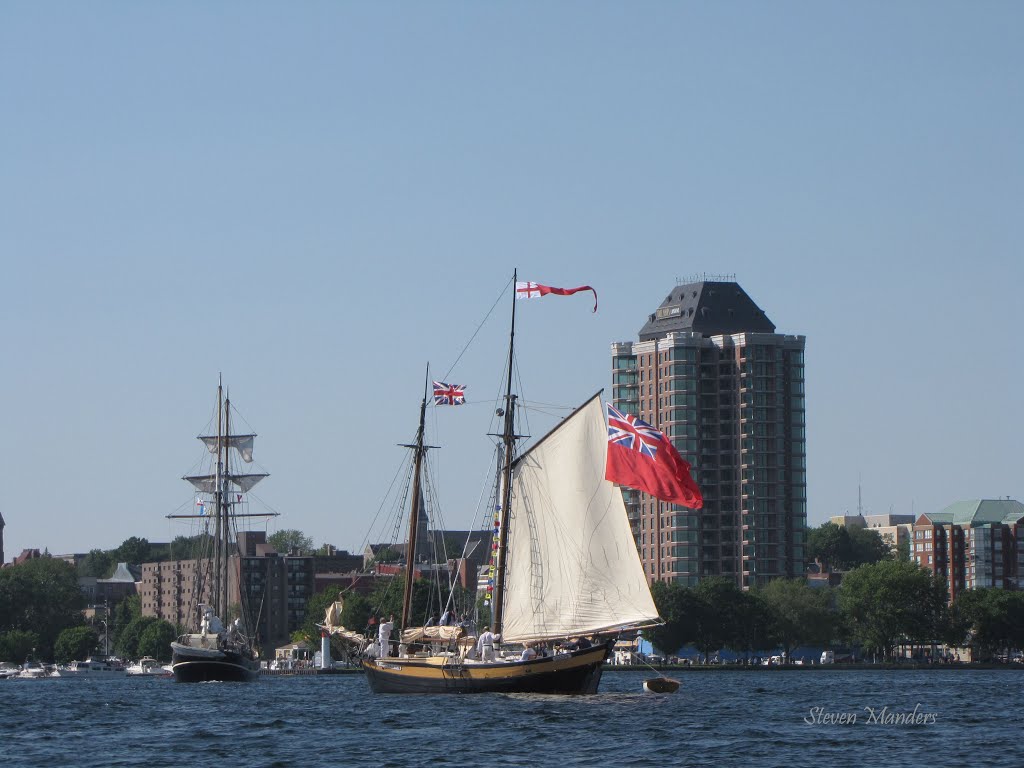 The Reveante sails into Brockville harbour.  The water is 32 m. deep here, about half the height of the tall apartment building.