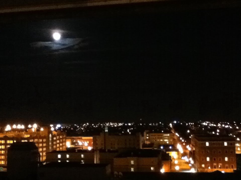 Oshawa facing south at night, with a full moon