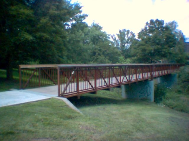 The Pine Creek pedestrian bridge in the full light of day.
