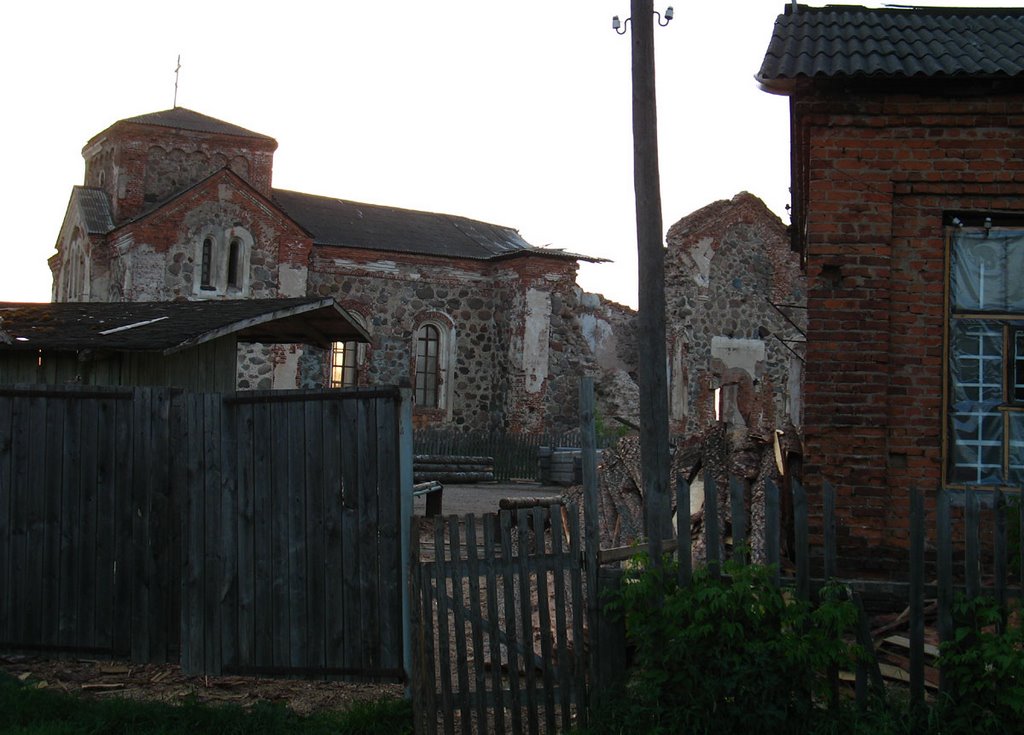 All Saints Orthodox Church in Biahomĺ. View througth the saw-mill