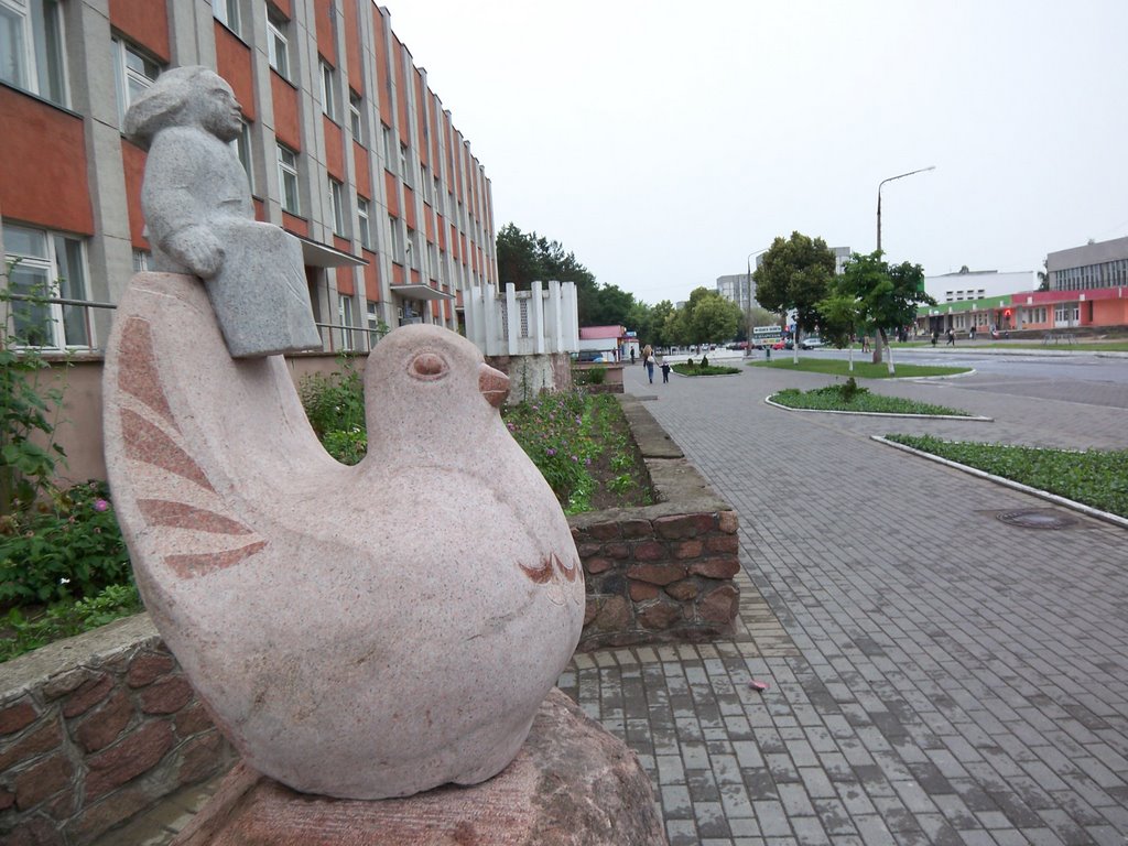 Sculpture of a dove and a girl near the childrens polyclinic