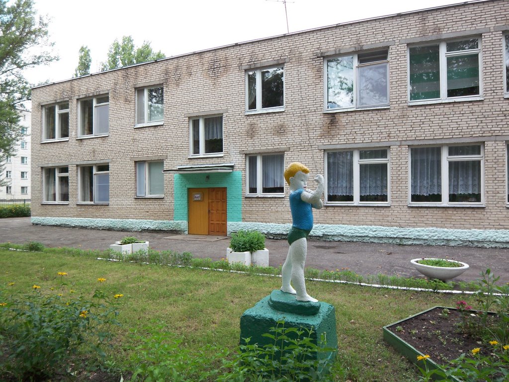 Sculpture of a Strong Boy before the kindergarten