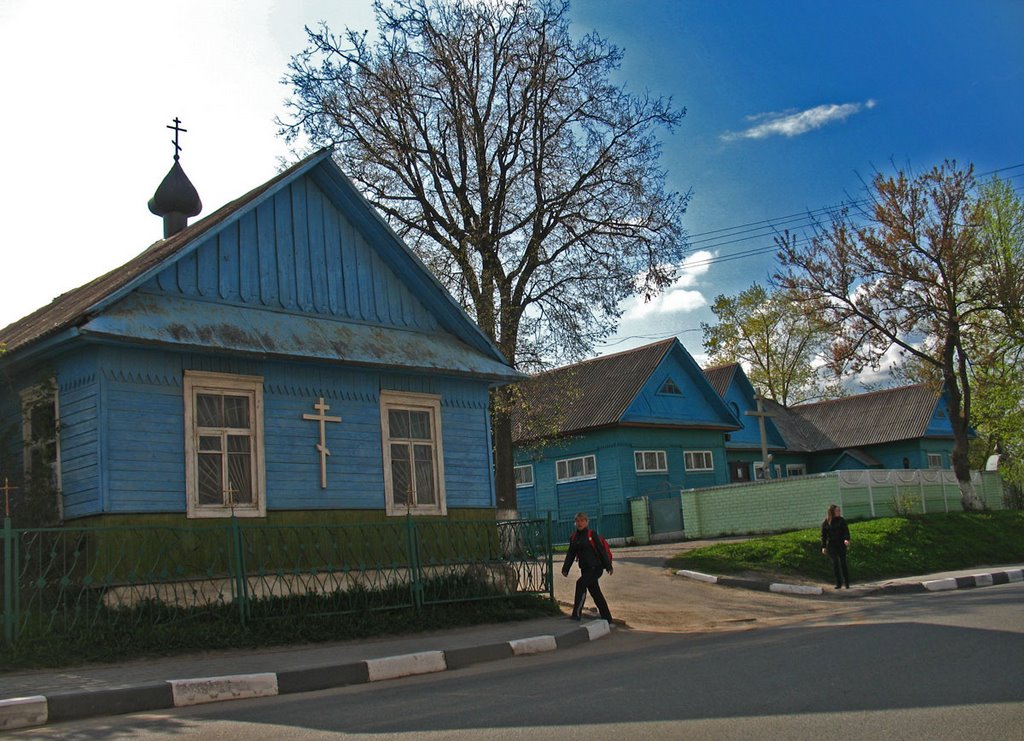 The Orthodox church at wooden houses in Smaliavičy