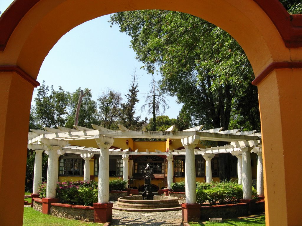 The italian garden with arches and a fountain