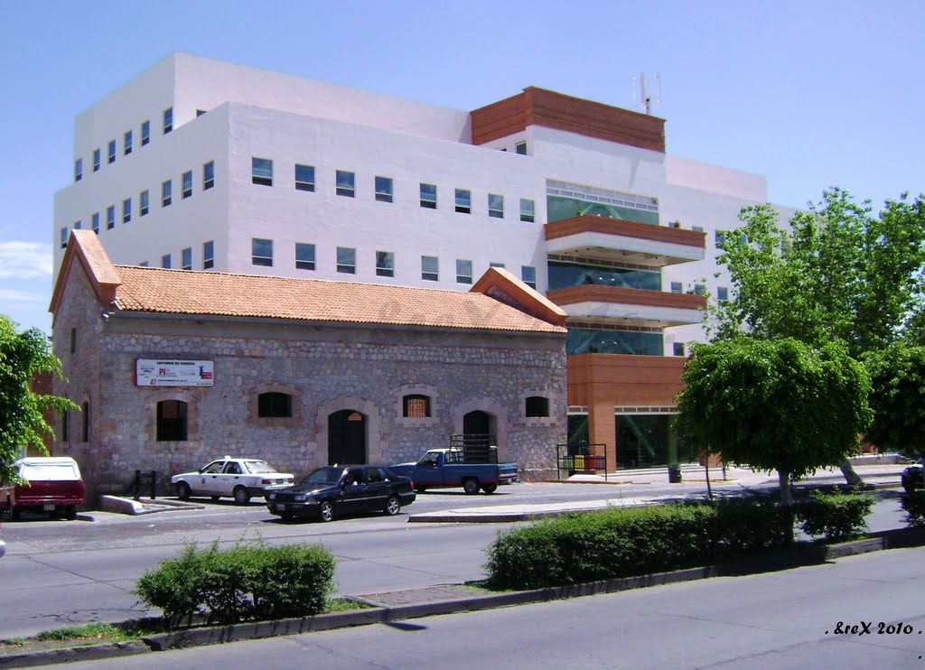 exestación del ferrocarril y edifico ecológico Tron hnos.