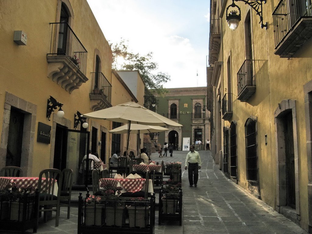 Al fresco seating of an Italian restaurant in a pedestrian alley