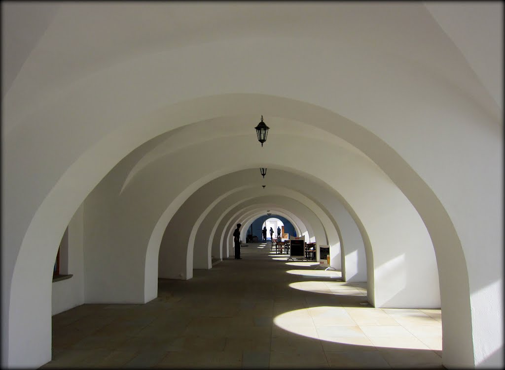 Arkády v budovách na námestí-Krosno / Arcade buildings in the square