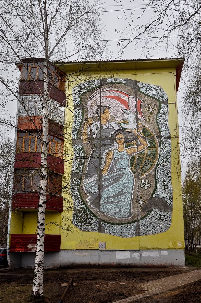 Soviet mosaic panel at wall of an apartment building