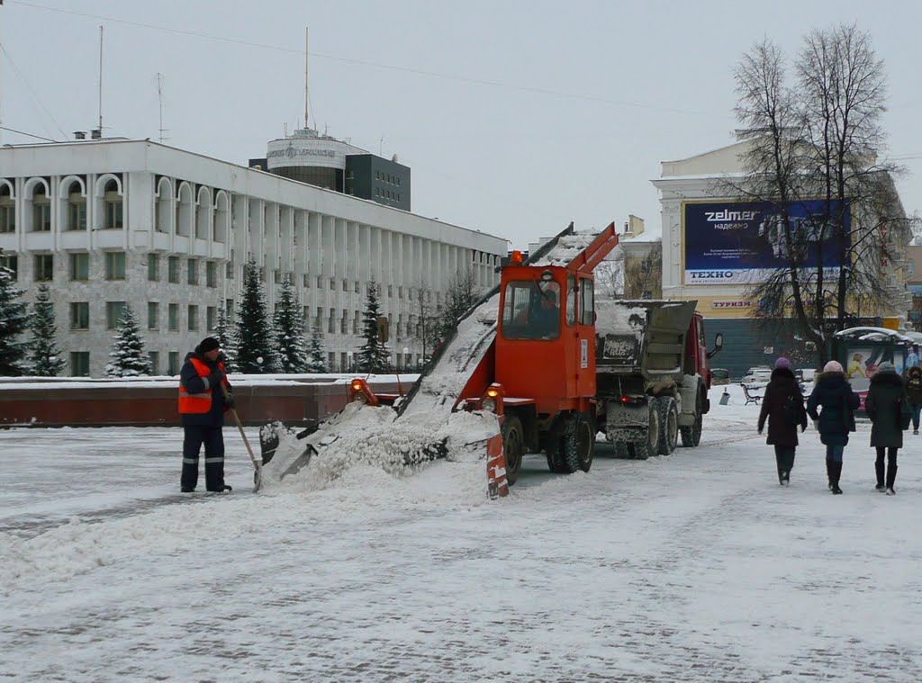 Snow shovellers - neverending work in russian winter