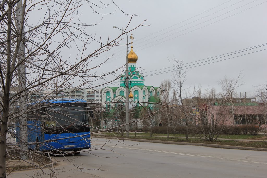 green church and blue bus
