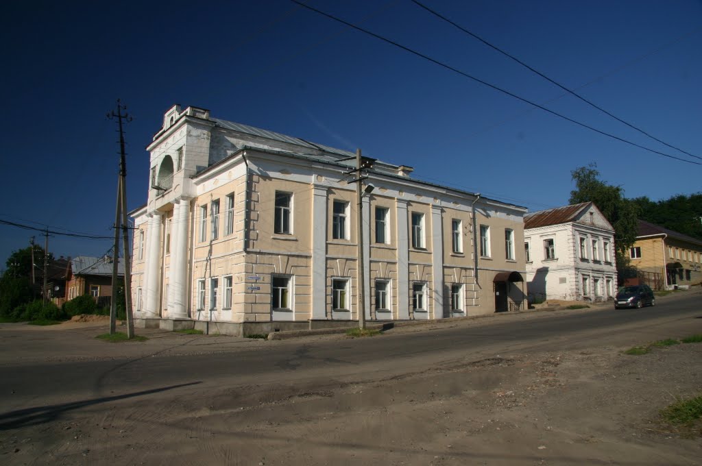 Дом в верхней части рядов