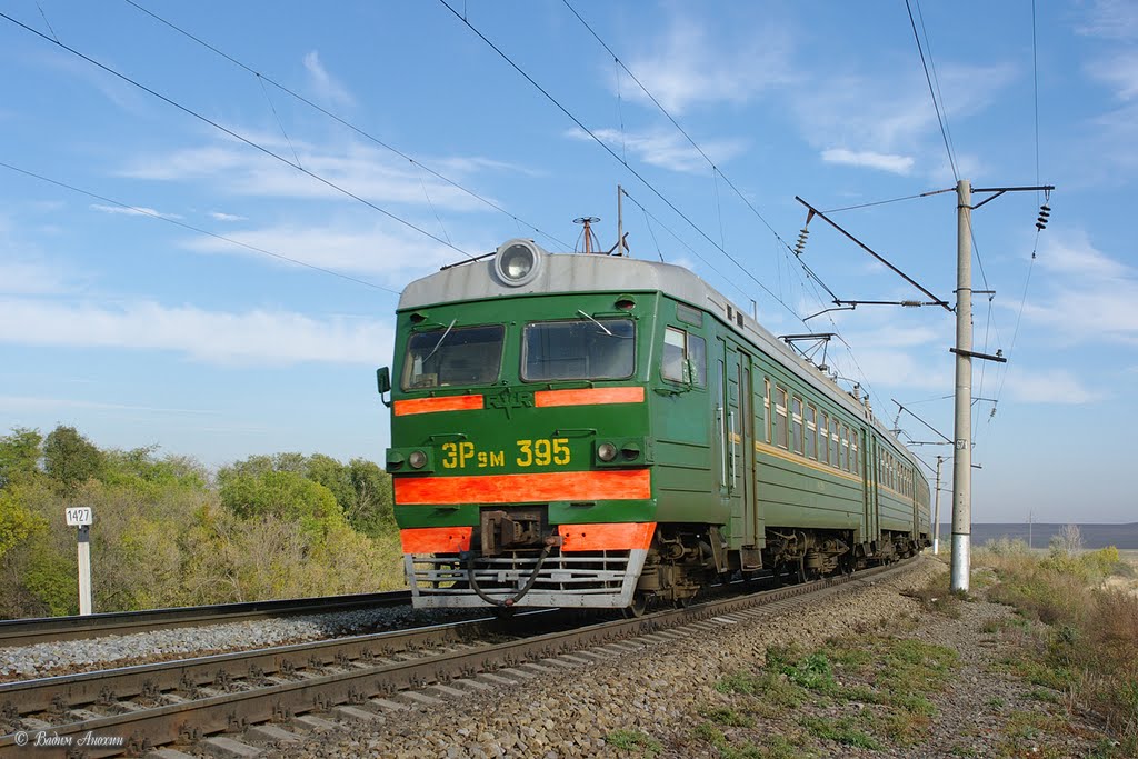 EMU-train ER9M-395 near train station Kuschevka
