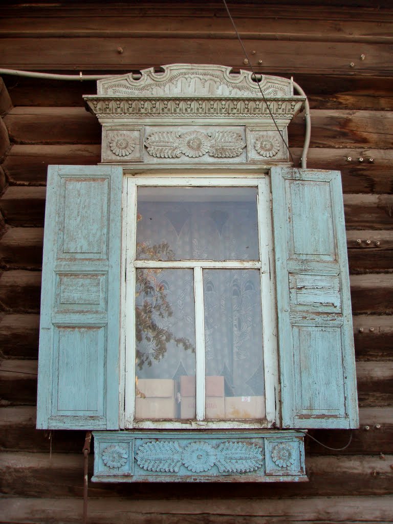Wooden jambs and lintel of a window of house on Gogolya street