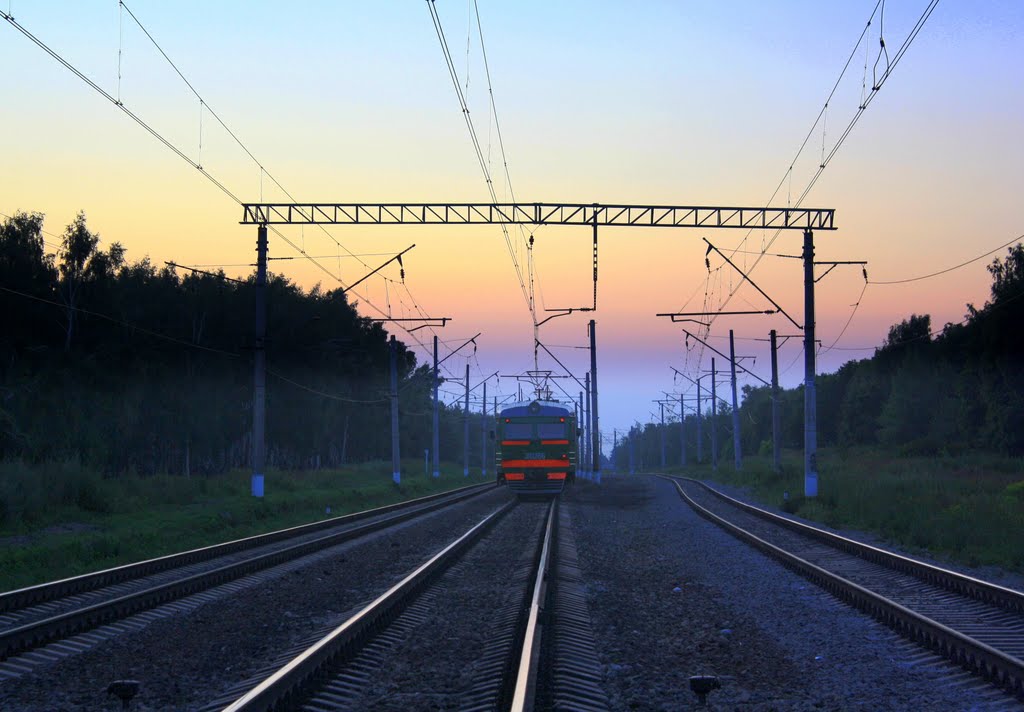 Electric train leaving in night