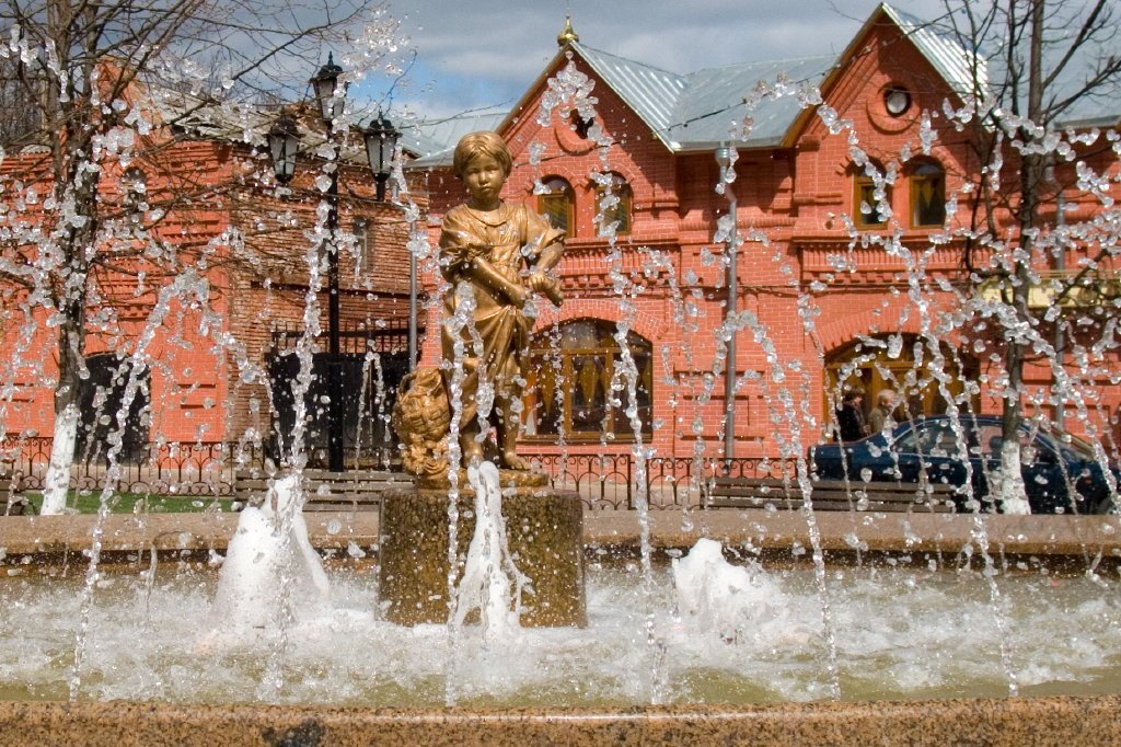 The Fountain with a little Girl
