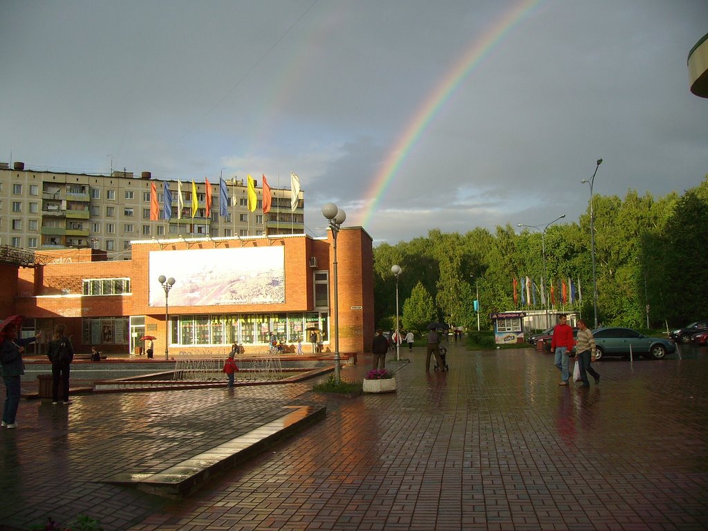 Raibow over city