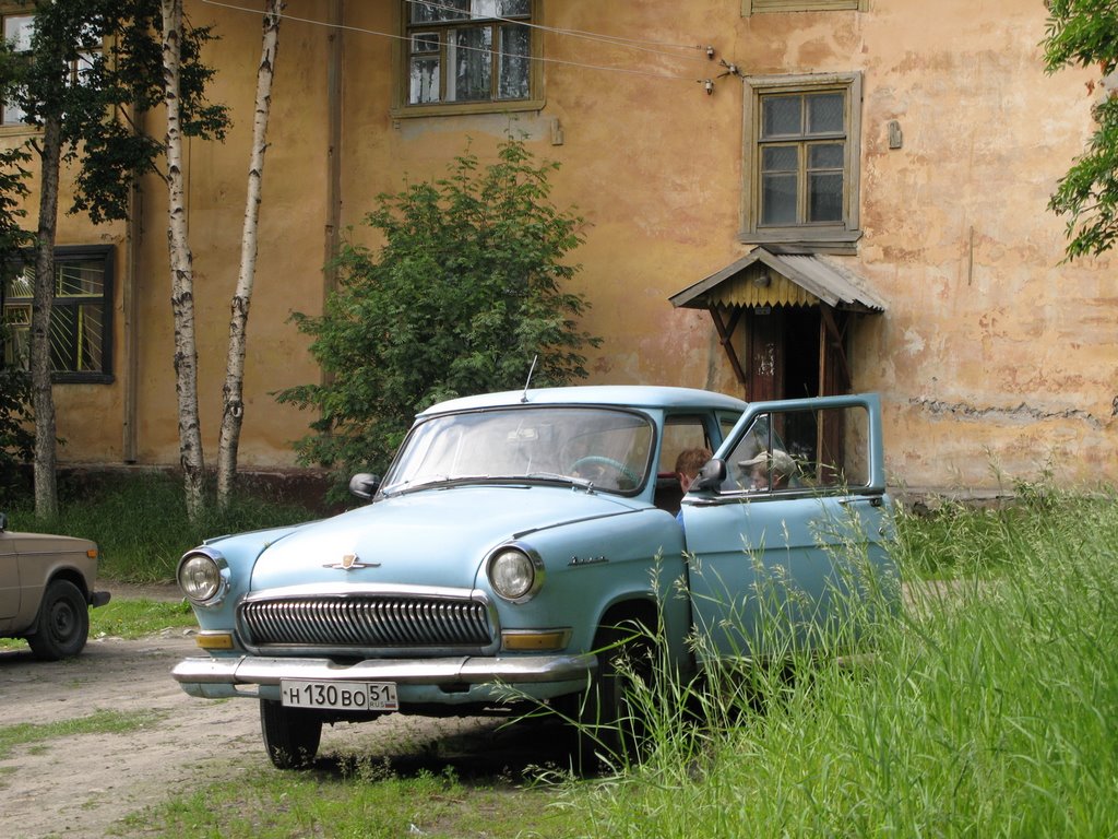 Kids playing with old car