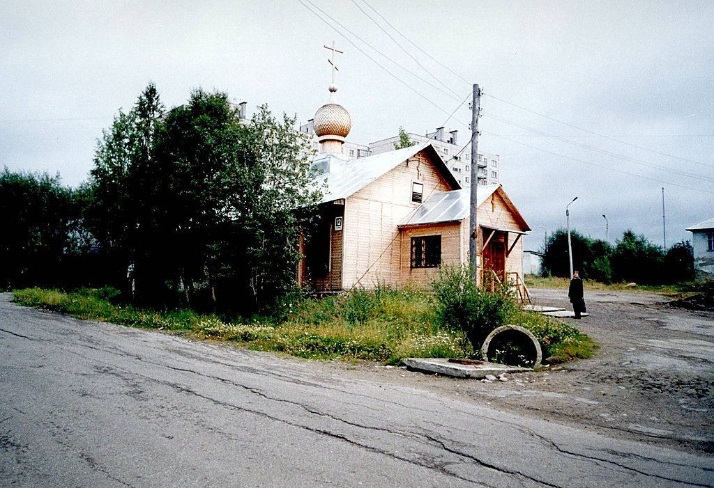 Деревянная церковь на улице Мира