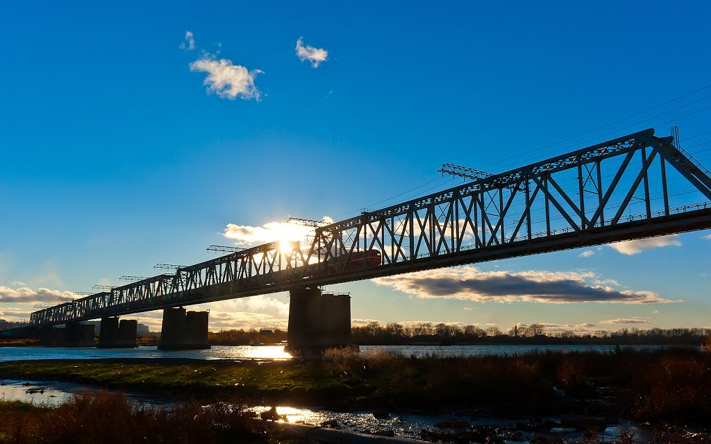 The first rail bridge across the Ob River at sunset, Built in 1897 / Транссиб, мост через Обь на закате, построен в 1897 г.