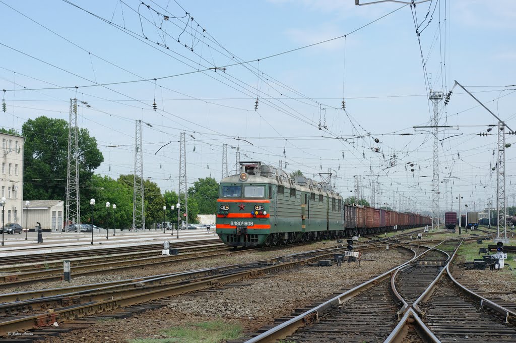 Electric locomotive VL80S-1808 with train on train station Bataysk