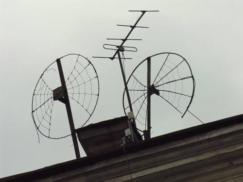 Funny TV antennas at roof of house on Petrovskaya embankment