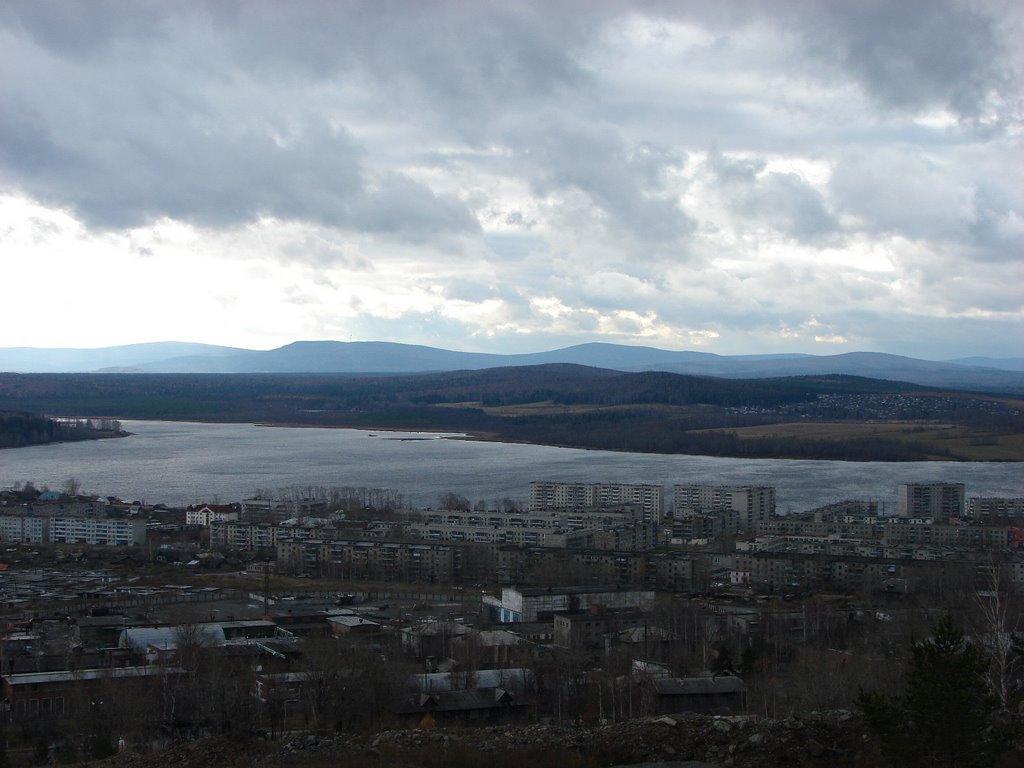 "City...pond...mountains...forest...clouds"