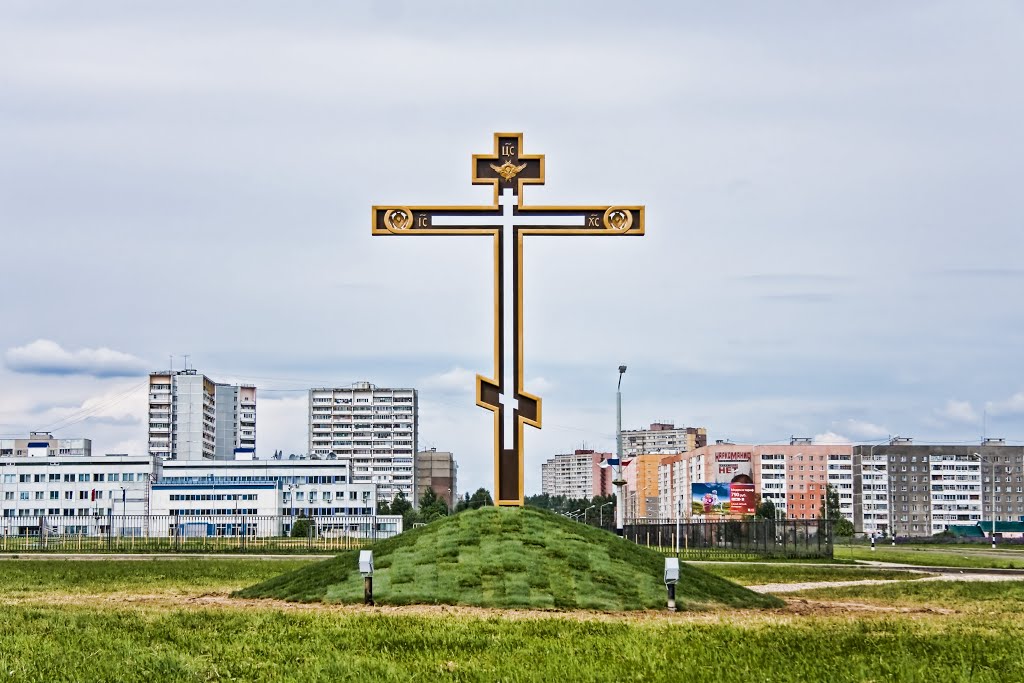 крест на вьезде в город