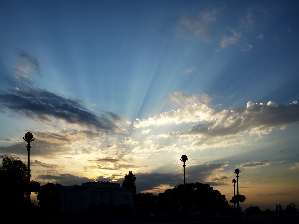 Sun beams at a sunset.