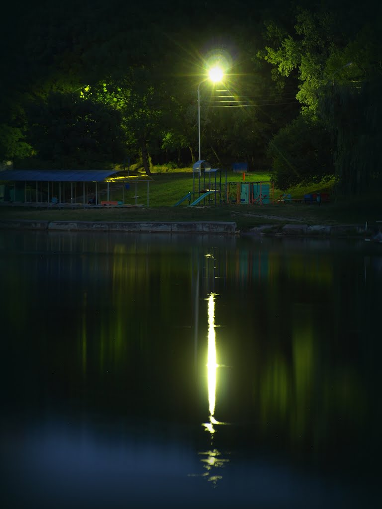 Evening, pond and lantern.