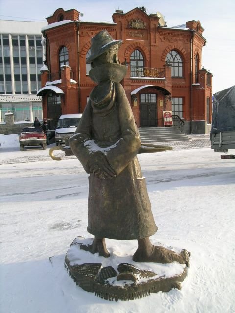 monumento al A. Cxehov flanke de dorso