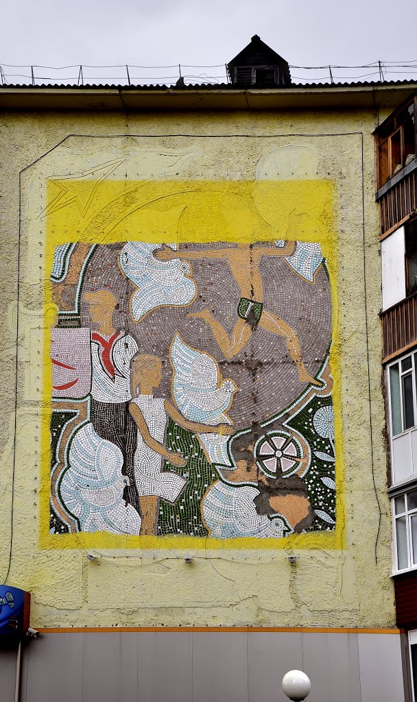 Soviet mosaic panel at wall of an apartment building
