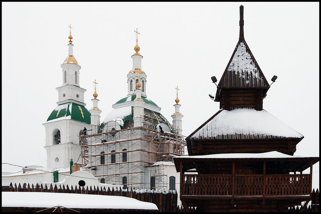 Wooden kremlin and church on a background in Jalutorovsk