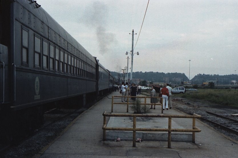 The excursion train for Chattanooga standing at the old Southern Railroad terminal site for boarding. Birmingham, Alabama. June 5, 1983.