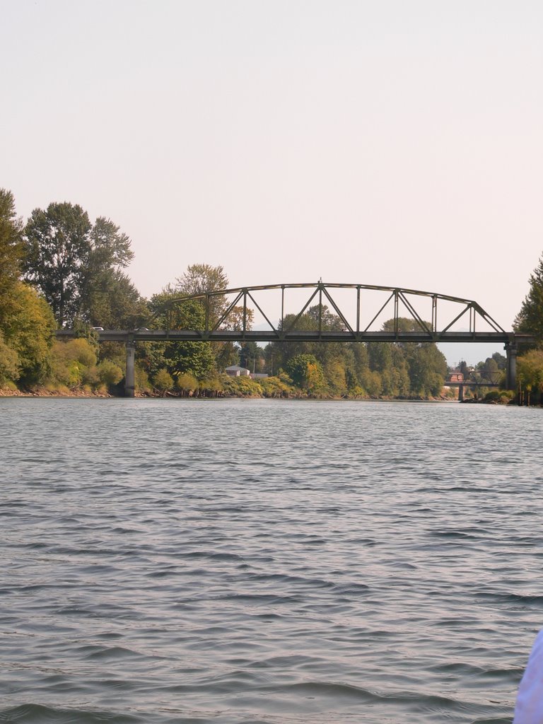 Kayaking upstream on Snohomish River near the town of Snohomish, WA