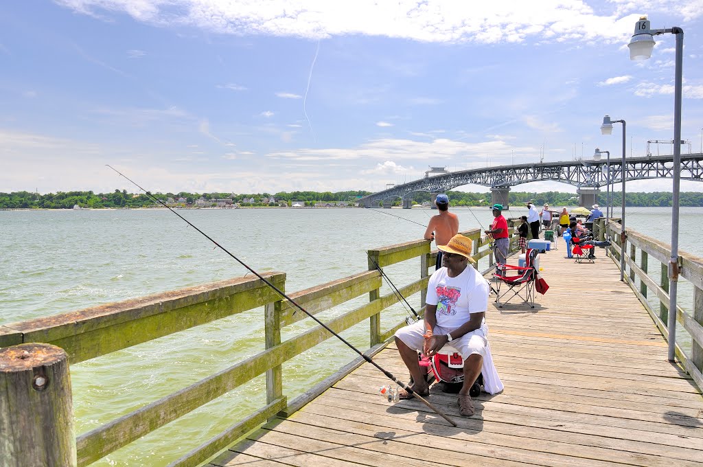 VIRGINIA: GLOUCESTER COUNTY: portrait of a fisherman on the Gloucester Point Beach Park Fishing Pier